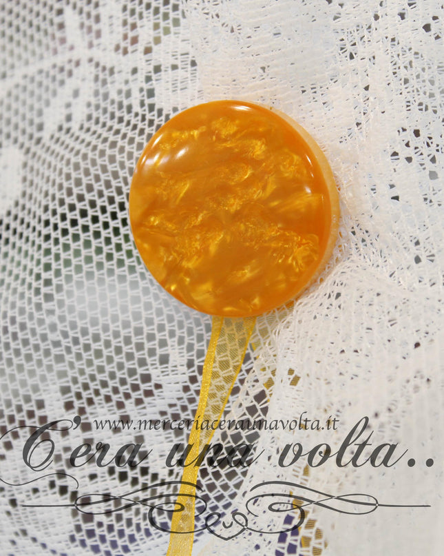 Fermatende Calamita Arancione