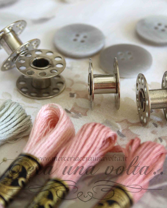 Bobine per macchine da cucire in metallo