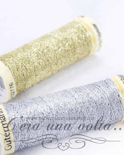 Filo da cucire oro e argento