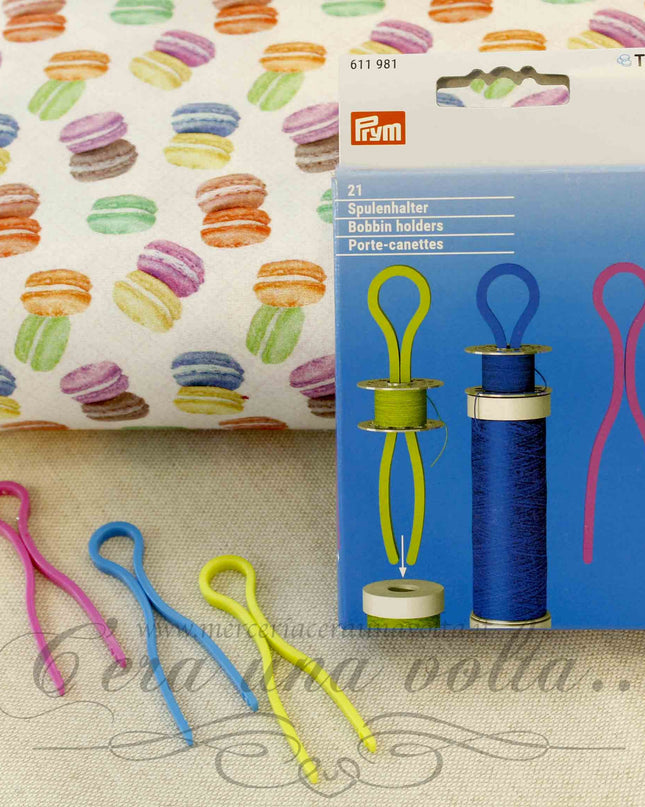 Ganci in plastica portabobine