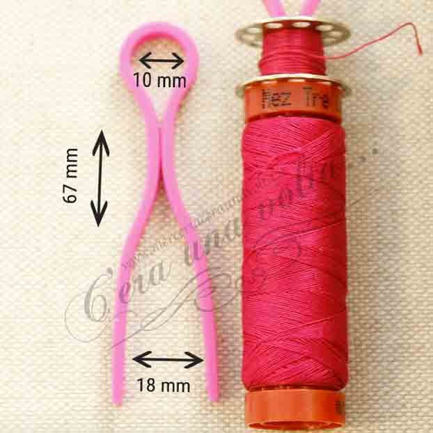 Ganci in plastica portabobine