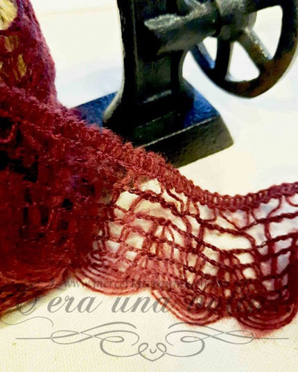 Pizzo smerlato in lana elasticizzato
