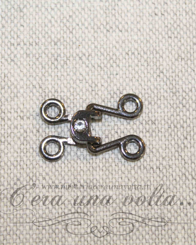 Ganci per abbigliamento con punto luce