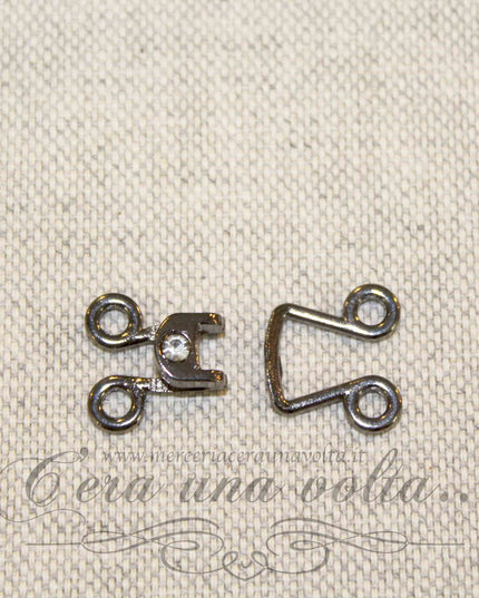 Ganci per abbigliamento con punto luce