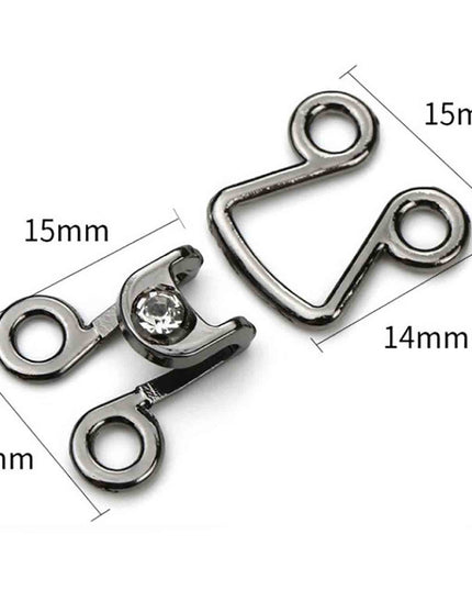 Ganci per abbigliamento con punto luce