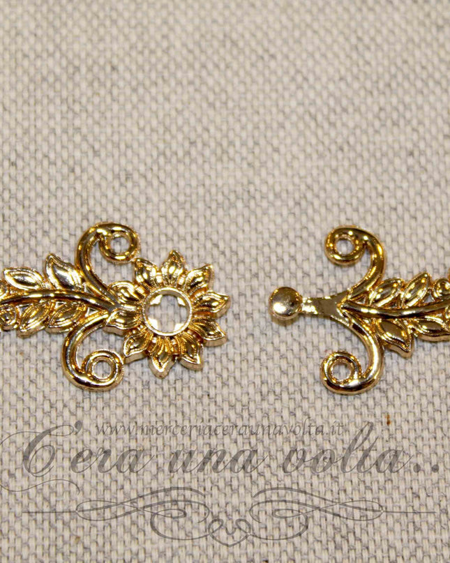 Agganciature per abbigliamento oro