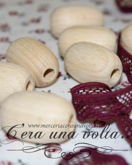 Perle ovali con foro grande in legno cm 2,8