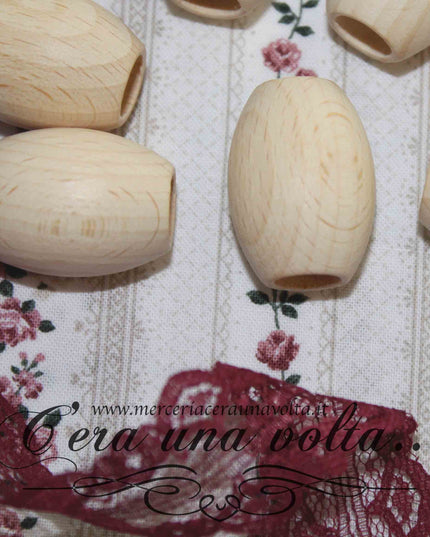 Perle ovali con foro grande in legno cm 3