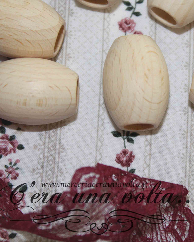 Perle ovali con foro grande in legno cm 3