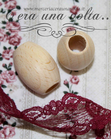 Perle ovali con foro grande in legno cm 3