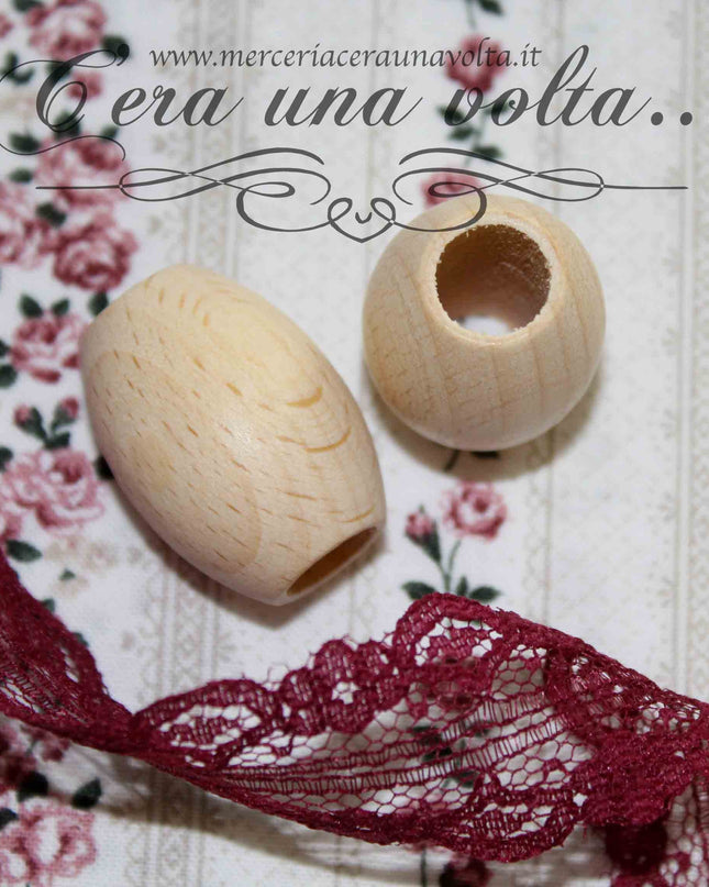 Perle ovali con foro grande in legno cm 3