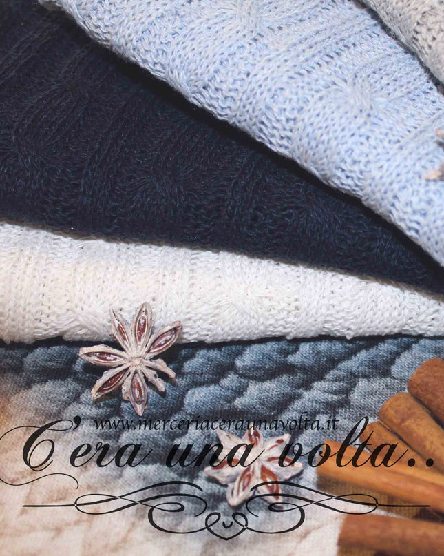 Taglio di tessuto con motivo a treccia