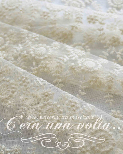 Tessuto pretagliato in pizzo