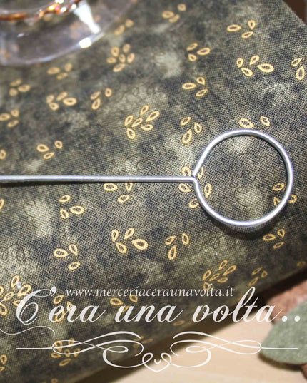 Uncino per rivoltare