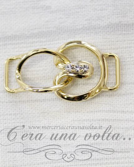 Agganciature per abbigliamento oro con strass