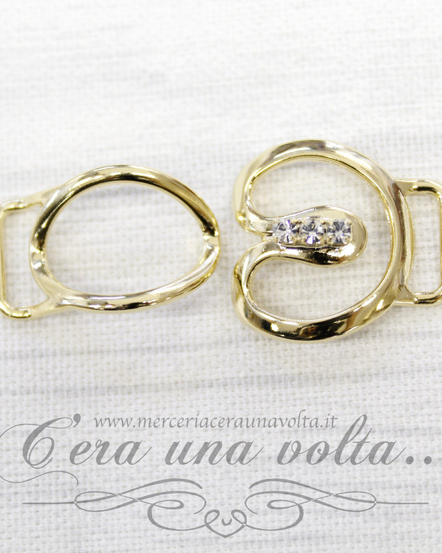 Agganciature per abbigliamento oro con strass