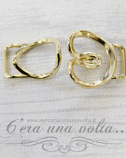 Agganciature per abbigliamento oro con strass