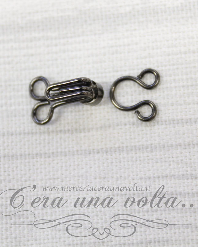 Ganci per abbigliamento con punto luce