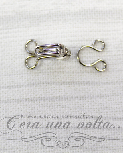 Ganci per abbigliamento argento con punto luce