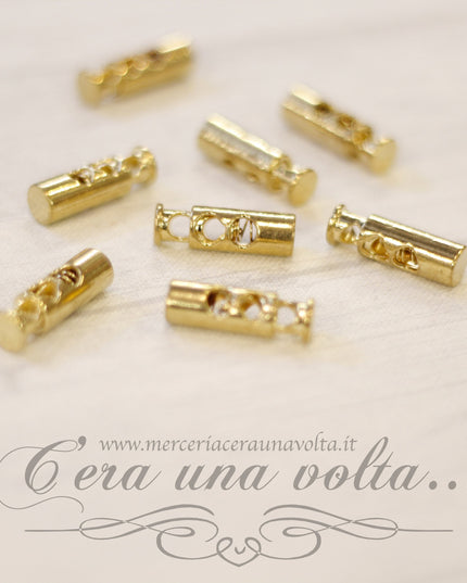 Fermacorda a molla Oro 2 fori in metallo