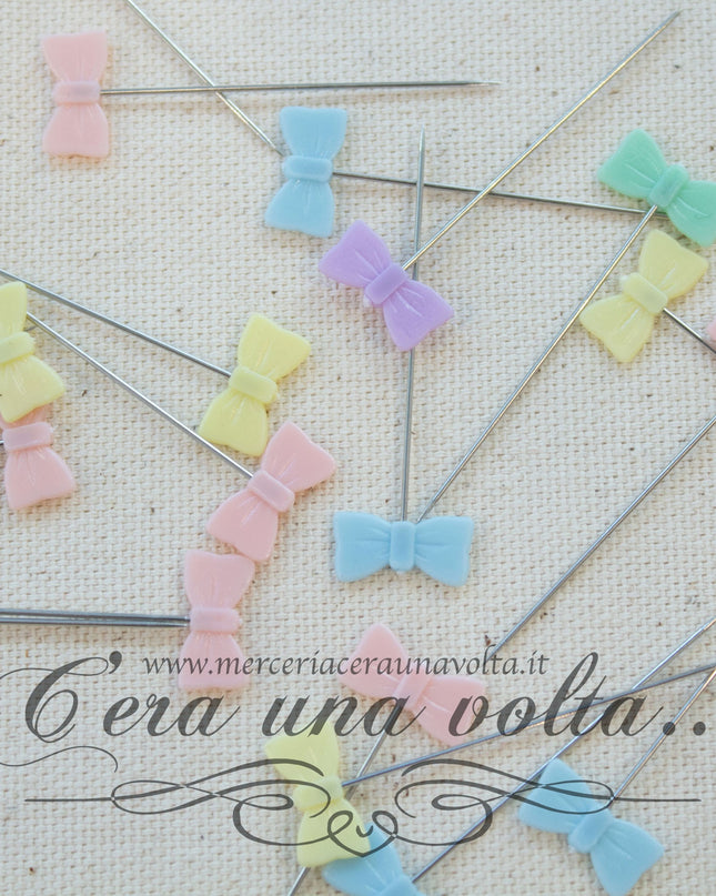 Spilli decorati in acciaio fiocco
